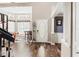 Inviting living area featuring a pool table and an adjacent dining space, filled with natural light at 2306 63Rd W St # 40, Bradenton, FL 34209
