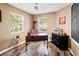Cozy office space with natural light, a stylish desk, and hardwood style flooring at 2306 63Rd W St # 40, Bradenton, FL 34209