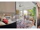 Relaxing screened porch with comfortable seating and a ceiling fan for outdoor enjoyment at 2306 63Rd W St # 40, Bradenton, FL 34209
