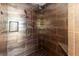 Modern shower with a rainfall showerhead, handheld sprayer, and built-in niche at 2306 63Rd W St # 40, Bradenton, FL 34209