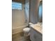Bright bathroom featuring tub with shower, sleek vanity, and wood-look tile flooring at 24831 Buckingham Way, Port Charlotte, FL 33980