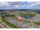 This single-Gathering home is situated in a tranquil community with ponds and lush landscaping at 2625 Star Apple Way, Sarasota, FL 34240