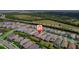This single-Gathering home is in a quiet community with trees and mature landscaping at 2625 Star Apple Way, Sarasota, FL 34240