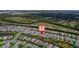 This single-Gathering home is in a community with nature views and mature landscaping at 2625 Star Apple Way, Sarasota, FL 34240