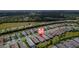 This single-Gathering home resides in a quiet community with trees and well-kept landscaping at 2625 Star Apple Way, Sarasota, FL 34240