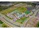 A lovely community with tennis courts, pool, clubhouse, playground, and green spaces at 2625 Star Apple Way, Sarasota, FL 34240