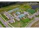 A beautiful community with tennis courts, pool, clubhouse, playground, and green spaces at 2625 Star Apple Way, Sarasota, FL 34240