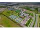 This lively community showcases tennis courts, a pool, clubhouse, playground, and green spaces at 2625 Star Apple Way, Sarasota, FL 34240