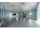 Spacious exercise room featuring modern fitness equipment, yoga balls, and hardwood style floors at 2625 Star Apple Way, Sarasota, FL 34240