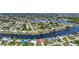 Aerial shot of charming waterfront homes nestled along a tranquil canal at 264 E Tarpon Nw Blvd, Port Charlotte, FL 33952