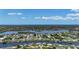 Scenic aerial view of a residential area by a waterway, highlighting the peaceful setting at 264 E Tarpon Nw Blvd, Port Charlotte, FL 33952