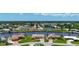 Aerial view of canal-front homes, showcasing waterfront living and neighborhood layout at 264 E Tarpon Nw Blvd, Port Charlotte, FL 33952