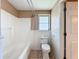 Bathroom with a bathtub, toilet, and neutral wall colors at 264 E Tarpon Nw Blvd, Port Charlotte, FL 33952