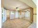 Spacious room with tile flooring, featuring closet doors and a ceiling fan at 264 E Tarpon Nw Blvd, Port Charlotte, FL 33952