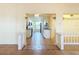 Bright kitchen with white cabinetry, modern appliances, and decorative wall accents at 264 E Tarpon Nw Blvd, Port Charlotte, FL 33952