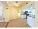 The kitchen features white cabinetry and modern appliances at 264 E Tarpon Nw Blvd, Port Charlotte, FL 33952