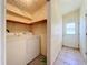 Convenient laundry area with washer, dryer, and easy access to the outside at 264 E Tarpon Nw Blvd, Port Charlotte, FL 33952