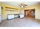 Spacious living area with tile flooring, built-in desk area, and open access to other living spaces at 264 E Tarpon Nw Blvd, Port Charlotte, FL 33952