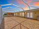 Spacious tiled outdoor patio featuring a full kitchen, perfect for entertaining at 264 E Tarpon Nw Blvd, Port Charlotte, FL 33952