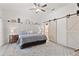 Comfortable main bedroom with barn door access to ensuite bathroom at 318 39Th Ne St, Bradenton, FL 34208