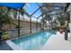 Screened-in pool provides backyard entertainment at 318 39Th Ne St, Bradenton, FL 34208