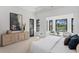 Well-lit main bedroom boasts sleek modern design and bright views at 3212 Signet Ct, Sarasota, FL 34240