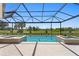 The backyard features a pool and golf course views at 3212 Signet Ct, Sarasota, FL 34240