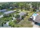 Aerial view of the property showing the home, large yard, storage shed and swimming pool at 3411 15Th E St, Ellenton, FL 34222