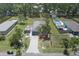Aerial view of property showcasing the home, driveway, yard, and swimming pool at 3411 15Th E St, Ellenton, FL 34222