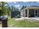 View of the backyard with shed and lawn equipment at 3411 15Th E St, Ellenton, FL 34222