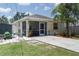 Exterior showcasing the screened patio, backyard, and convenient shed for additional storage at 3411 15Th E St, Ellenton, FL 34222
