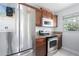 Cozy kitchen featuring stainless steel refrigerator and appliances at 3411 15Th E St, Ellenton, FL 34222