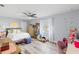 Bright bedroom with ample natural light, ceiling fan, and stylish decor at 3415 Knox Ter, Port Charlotte, FL 33948