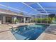 Sparkling pool with screened enclosure and ample deck space for outdoor enjoyment at 3415 Knox Ter, Port Charlotte, FL 33948
