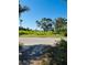 Street view of cleared lot ready for building near open water at 3601 Riverview Blvd, Bradenton, FL 34205