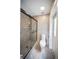 Full bathroom features tiled shower and toilet at 3810 Hidden River Rd, Sarasota, FL 34240