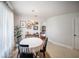 Dining room with round table, chairs, and decor at 3810 Hidden River Rd, Sarasota, FL 34240