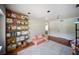 Bright playroom featuring large bookshelves and play furniture at 3810 Hidden River Rd, Sarasota, FL 34240