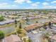Stunning aerial view of a residential community, showcasing well-maintained homes and scenic waterfront property at 3901 41St W St, Bradenton, FL 34205