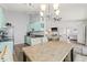 Open-concept kitchen and dining area featuring modern appliances and comfortable seating for gatherings at 3901 41St W St, Bradenton, FL 34205