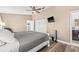 Primary bedroom with wood-look floors, fan, and natural light at 3901 41St W St, Bradenton, FL 34205