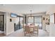 Cozy dining area with sliding glass doors and view of the patio at 3914 Glen Oaks Manor Dr, Sarasota, FL 34232