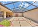 Generous screened-in patio with an open layout, offering versatile space for various outdoor activities and relaxation at 3914 Glen Oaks Manor Dr, Sarasota, FL 34232