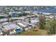 Aerial view of home on canal with well maintained landscaping and neighborhood at 407 63Rd St, Holmes Beach, FL 34217