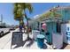 Charming beach hut convenience store with a vintage feel and colorful signage at 407 63Rd St, Holmes Beach, FL 34217