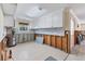 Kitchen remodel reveals exposed studs, new backsplash, and white cabinets at 407 63Rd St, Holmes Beach, FL 34217
