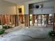 Partially renovated living room features wood studs and visible electrical work at 407 63Rd St, Holmes Beach, FL 34217