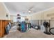Bright living area shows ceiling fan, a Beach sign, and items from a prior renovation at 407 63Rd St, Holmes Beach, FL 34217
