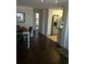 Open-concept featuring hardwood floors leading into the kitchen at 407 63Rd St, Holmes Beach, FL 34217