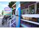 Beach Bums Island Attitude surf shop exterior with surfboards and bicycles at 407 63Rd St, Holmes Beach, FL 34217